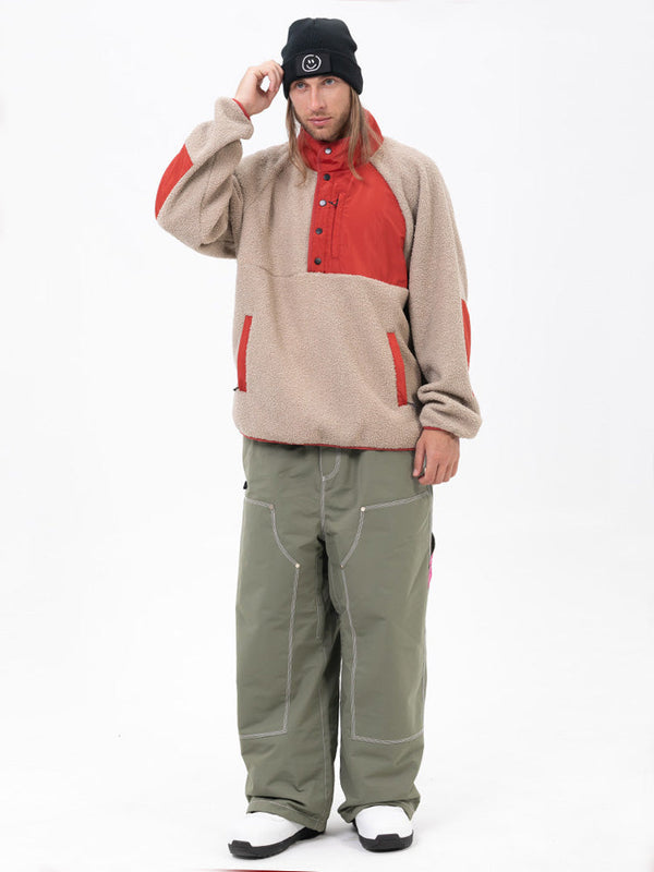 Set aus Herren-Pullover aus Kunstfleece und lässiger Freerider-Schneehose im urbanen Streetstyle
