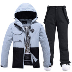 Damen-Skijacke und -hose in Colorblock-Optik für jedes Wetter, geeignet für Outdoor-Aktivitäten.