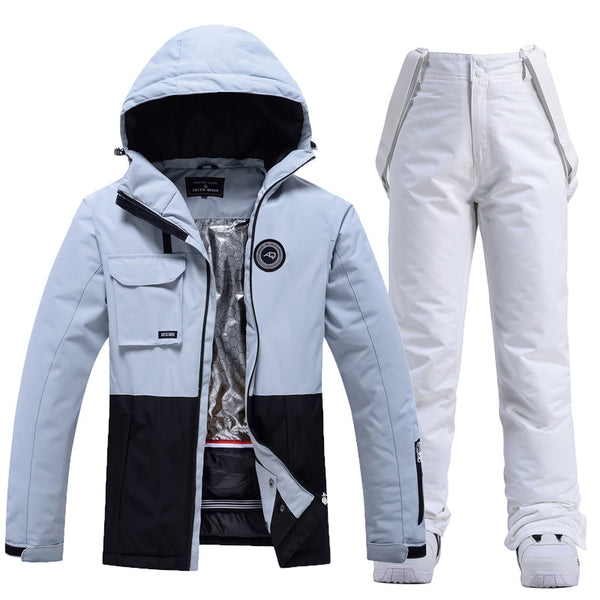 Damen-Skijacke und -hose in Colorblock-Optik für jedes Wetter, geeignet für Outdoor-Aktivitäten.